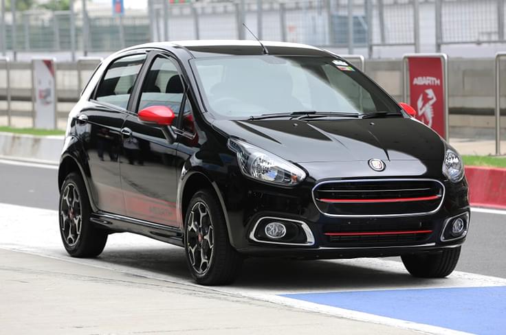 The Abarth Punto gets contrast colouring inserts in the grille along with Abarth decals on the doors and The Abarth Punto gets contrast colouring inserts in the grille along with Abarth decals on the doors and