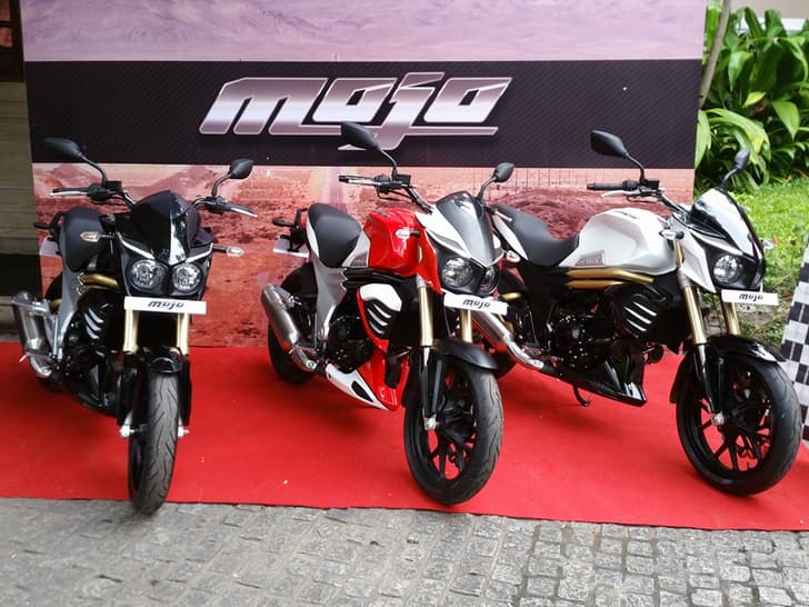 The Mojo is available in three paint schemes with an all Black, Black + White and the Mahindra Racing Red + White colours.