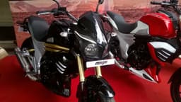 The motorcycle gets twin pod headlamps with DRL's and top-spec upside down front forks