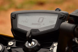 The instrument cluster is an all-digital unit with a cascading tachometer and a gear shift indicator.
