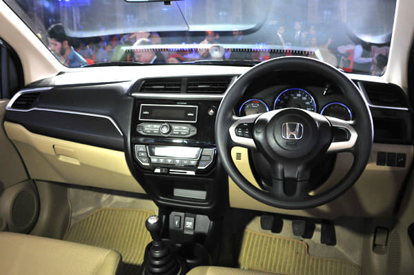 The two-tone beige & black interior scheme is maintained, but the new design and materials feel really top-notch.