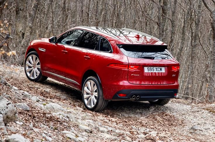 The silhouette design and rear spoiler lend the F-Pace sportscar-like aerodynamics. The silhouette design and rear spoiler lend the F-Pace sportscar-like aerodynamics.
