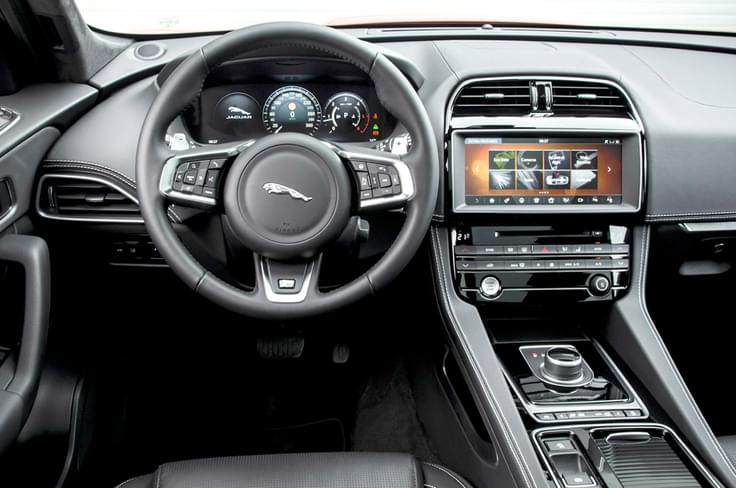 The interior is simple and well appointed with the use of leather and plastic that feel top notch. The interior is simple and well appointed with the use of leather and plastic that feel top notch.