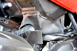 Rubber flaps are used instead of plastic to conceal the air-box hose pipe.