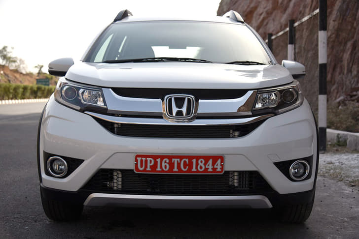 Despite being based on the same platform as the Brio and Mobilio, the BR-V face is bespoke with a squared-out bonnet, angular headlamps and chrome-rich, two-part grille.