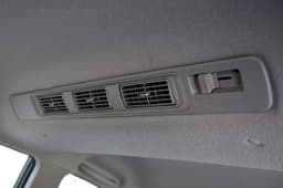 Second-row occupants get roof mounted air-con vents with blower controls.