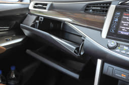 There are two gloveboxes, of which one is cooled, but neither is very large; one large one might have been better.