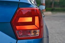 Small square tail-lamps do little to take away the abruptness of the boot.
