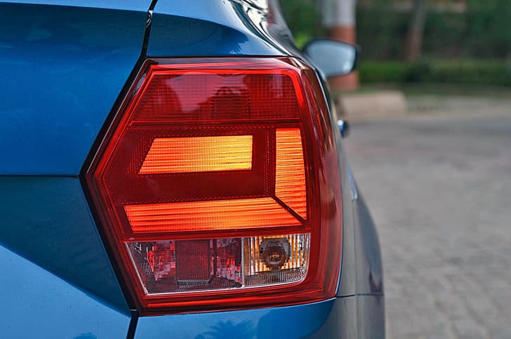 Small square tail-lamps do little to take away the abruptness of the boot.