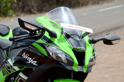 The windscreen is slightly wider than before, and it gets cleverly placed side intakes to reduce negative air pressure.