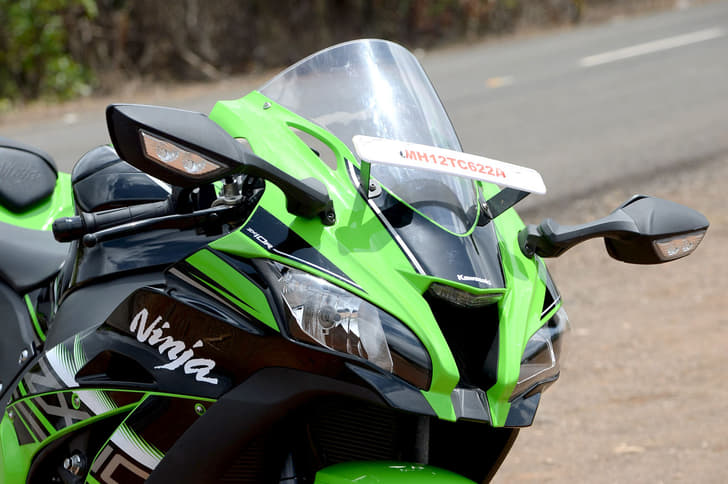 The windscreen is slightly wider than before, and it gets cleverly placed side intakes to reduce negative air pressure.