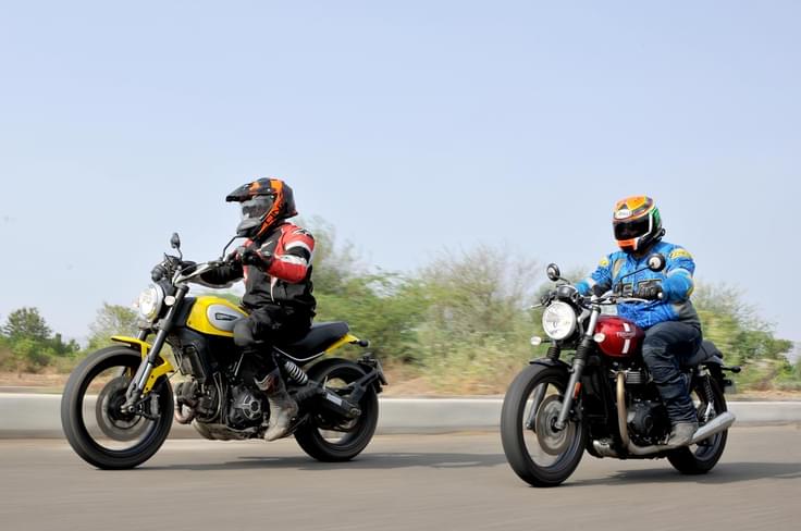 The Street Twin is supposed to be a standard, road-going motorcycle while the Scrambler feels like it was designed to handle a multitude of surfaces. The Street Twin is supposed to be a standard, road-going motorcycle while the Scrambler feels like it was designed to handle a multitude of surfaces.