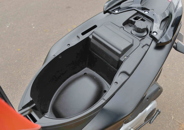 Storage space is adequate as long as you don’t want to pack in a full face helmet. There are no LEDs in there or charging ports. 