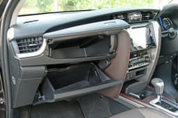 The storage compartments at the top can be cooled, while the one below can be locked.