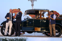 Best of Show Car - 1914 Wolsley 30/40 HP - Mr. Guillaume Alix, Cartier Regional Managing Director, Middle East, India & Africa presenting award to owner Mr. Shrivardhan Kanoria