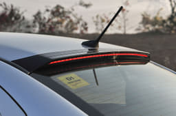 Blackened lip above the rear windscreen is home to auxiliary LED brake lights. Note ridges for roof hump.