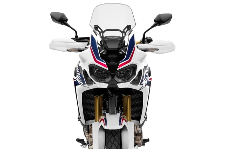 The Africa Twin is immediately recognizable with its dual headlights and upright front fairing. The Africa Twin is immediately recognizable with its dual headlights and upright front fairing.