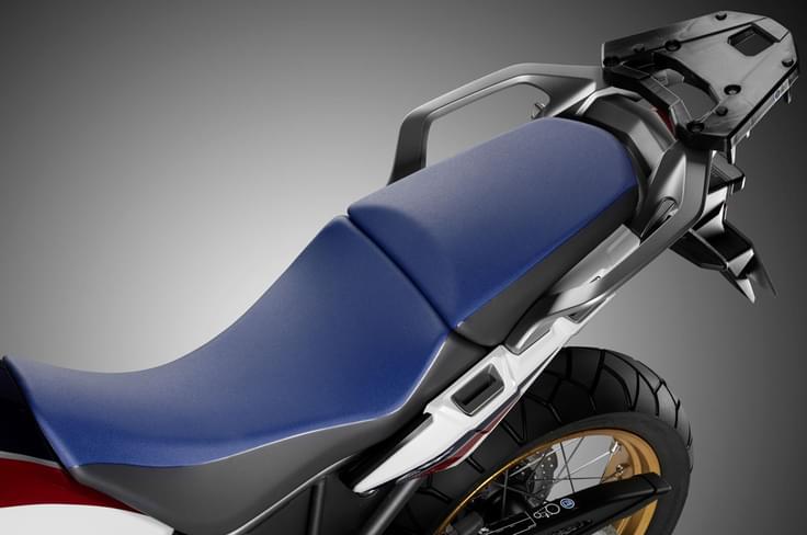 The Africa Twin’s seat is a single unit and comes with a low seat option. The Africa Twin’s seat is a single unit and comes with a low seat option.