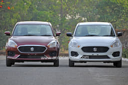 The base Dzire (right) gets silver trim bits in place of chrome as on the higher variants, and black door mirrors.