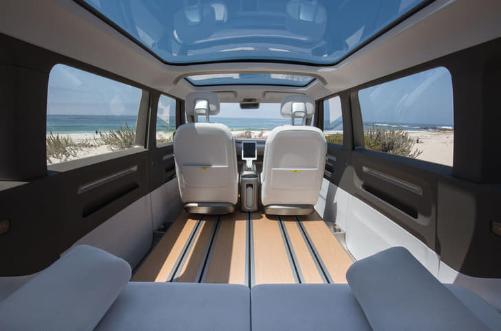 Seating arrangement can be moved using grooves in floor.