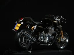 Norton Commando 961 Sport rear three-quarters view in black.