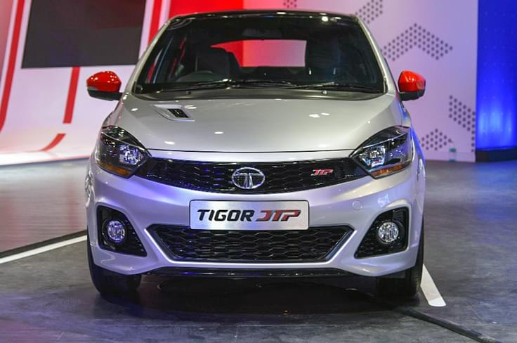 Sporty bumpers, side skirts, new wheels and a bonnet scoop set it apart from the standard Tigor. Sporty bumpers, side skirts, new wheels and a bonnet scoop set it apart from the standard Tigor.