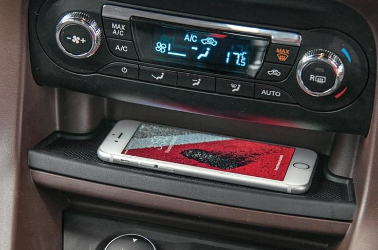 Recess for phone has anti-skid base. Recess for phone has anti-skid base.