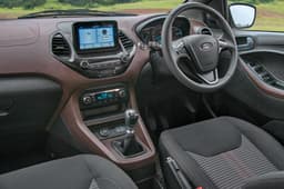 Dash from Figo but restyled to house touchscreen. Brown-on-black theme is interesting.