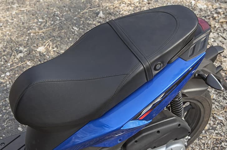 SR 125's seat is narrow and least comfortable as compared to the other scooters here.