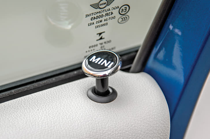 Monogrammed door locks are a cool touch.