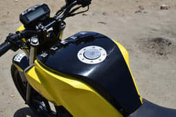 Fuel tank capacity has been reduced to 5 litres to accommodate the batteries. 