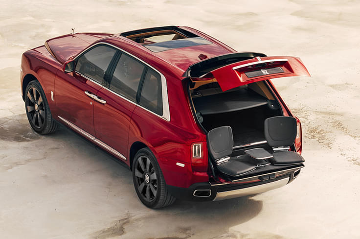 The Viewing Suite includes two leather seats and a picnic table that extend from the rear compartment of the Cullinan. The Viewing Suite includes two leather seats and a picnic table that extend from the rear compartment of the Cullinan.