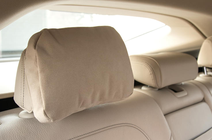 Like the Merc E-class, the 6GT also gets soft pillows for the rear-seat headrests. Great to doze off on. Like the Merc E-class, the 6GT also gets soft pillows for the rear-seat headrests. Great to doze off on.