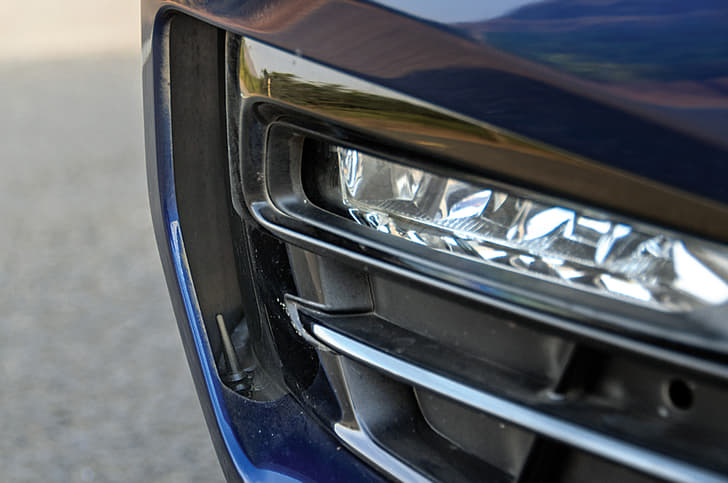 Air inlets and outlets help reduce turbulence in front wheel arches.