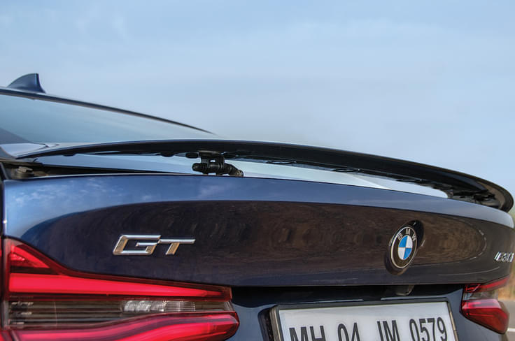 Rear spoiler rises automatically above 120kph, lowers under 80kph. Rear spoiler rises automatically above 120kph, lowers under 80kph.