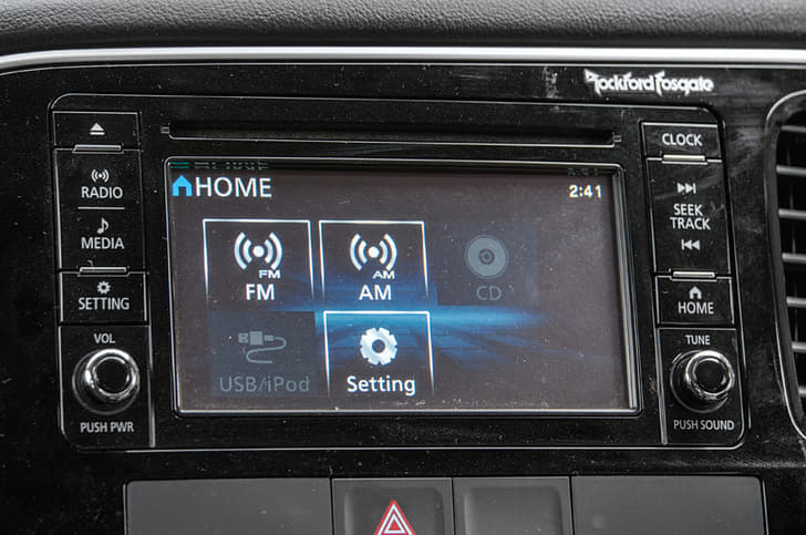 Small 6.1-inch touchscreen unit feels quite basic.