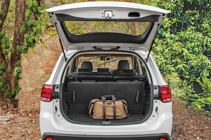 With the third row up, you can fit in a few soft bags; loading lip is low enough too. With the third row up, you can fit in a few soft bags; loading lip is low enough too.