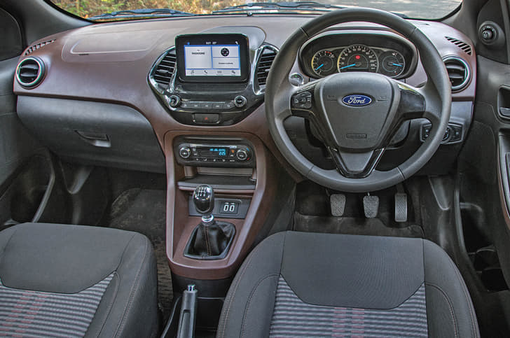 All black and brown dashboard top makes the cabin a bit too dark.