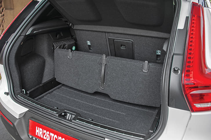 Storage area beneath the boot floor.