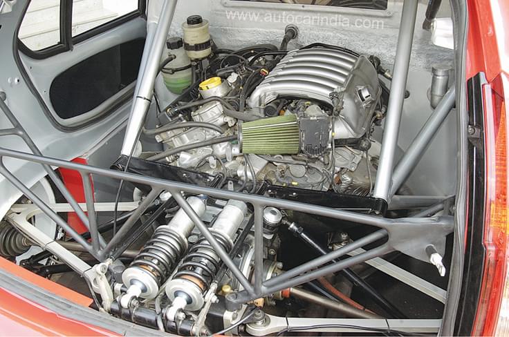 No seats in the back, but a massive racing motor and race car suspension. No seats in the back, but a massive racing motor and race car suspension.