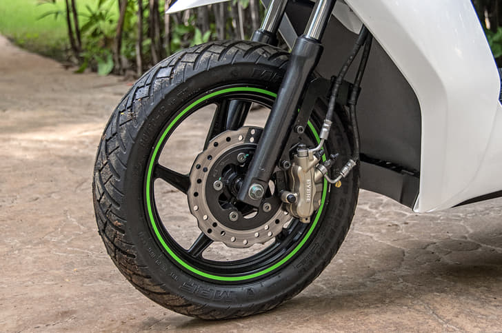 30mm telescopic fork offers firm ride; front disc feels dull but gets combined braking.