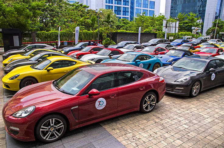 Over 40 Porsches participated in the Mumbai drive, despite a heavy rain forecast. Over 40 Porsches participated in the Mumbai drive, despite a heavy rain forecast.