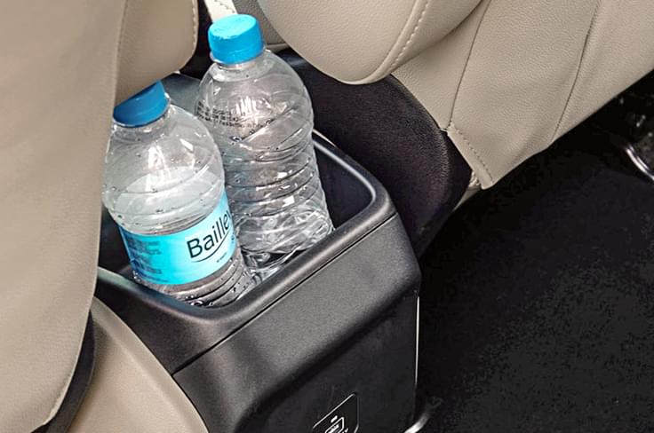 Bottle holders everywhere. Single USB charging port for back seat. Bottle holders everywhere. Single USB charging port for back seat.