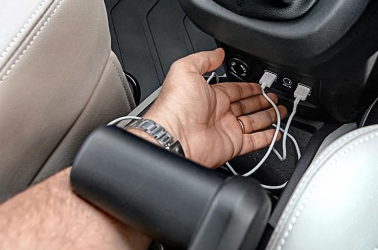 Front USB ports not easy to access. Handbrake lever fouls with hand. Front USB ports not easy to access. Handbrake lever fouls with hand.
