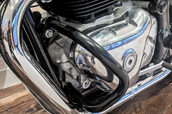 The gloss-black finished guard