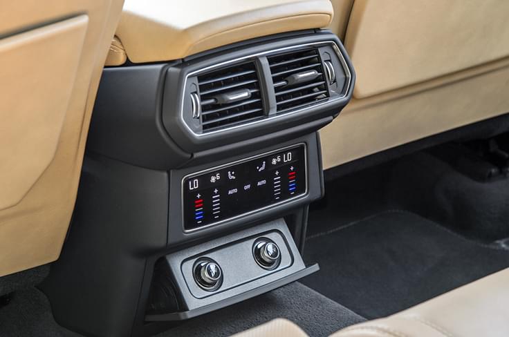 Controls for the rear seat AC. Controls for the rear seat AC.