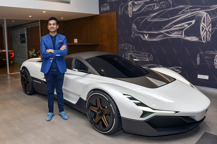 Chunky Vazirani with the Shul hypercar.