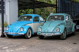 Anoop Thakur&#8217;s dual-tone Beetle strikes a pose alongside Allan Almeida&#8217;s turquoise blue Beetle. 