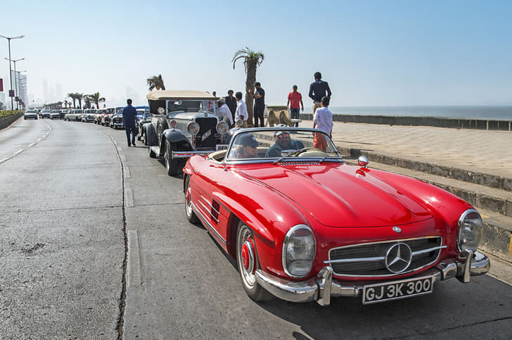 The fabulous 300SL Roadster and Nurburg lead the convoy of Mercs.