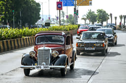A rare 170V cabriolet tailed by a W123 sedan. 